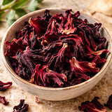 Illustrative image of organic hibiscus ingredient, not the actual packaged 1 oz bag